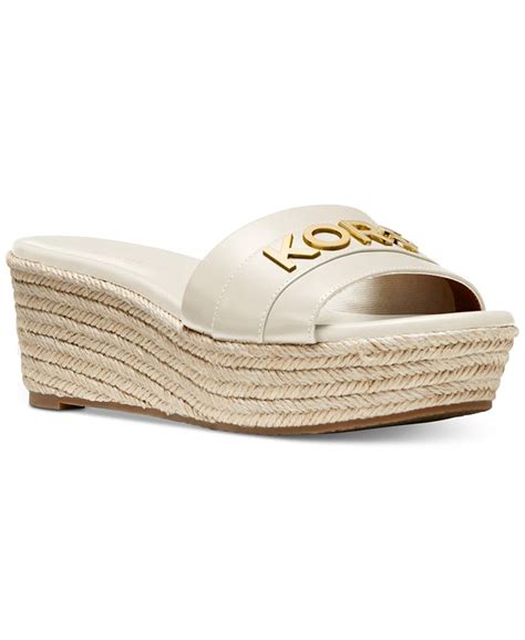 michael kors brady logo sandal jeans|MICHAEL Michael Kors Brady Metallic Logo Platform Sandals.